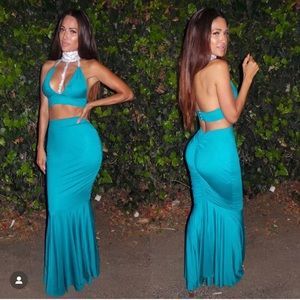 Turquoise blue two piece skirt set. With cut out and diamond like collar.